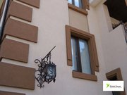 Облицовка фасада силиконовой декоративной штукатуркой
